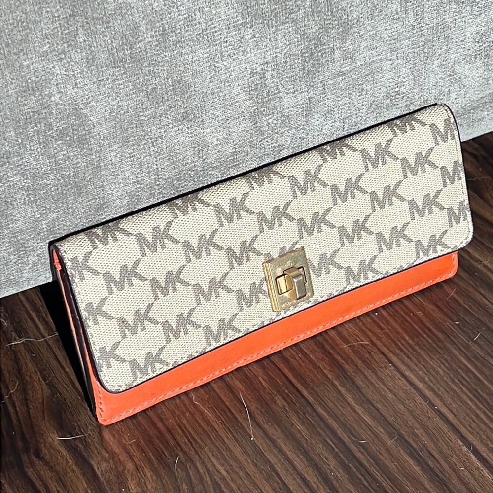 Michael kors wallet. Orange with tan